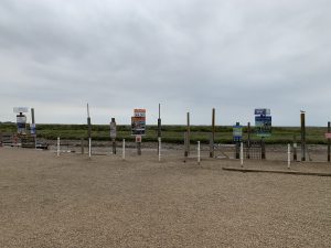 Carnser Pay and Display Car Park by seal trip boards on Quay