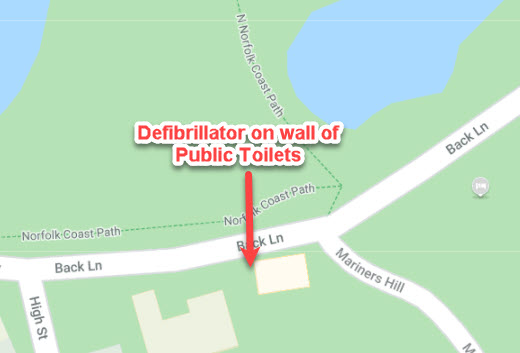 Defibrillator on Blakeney Quay on side of Public Toilets